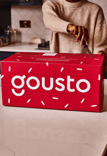 A looped recording of a Gousto recipe box being unboxed and cooked